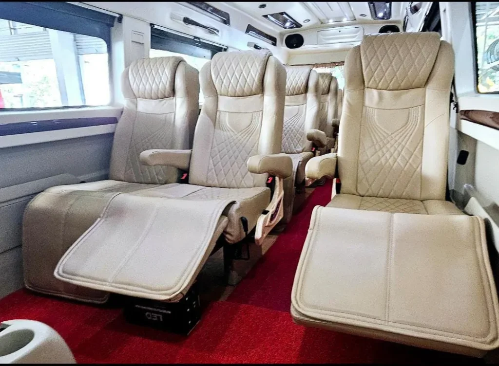 Maharaj tempo traveller seats